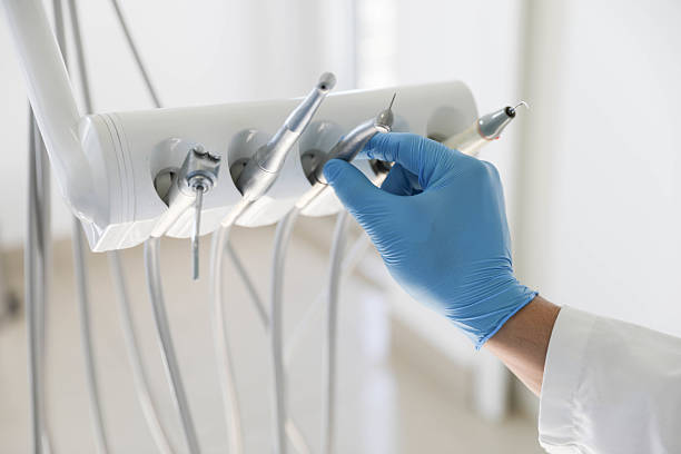 Professional Tooth Extraction technician working in Milton, GA